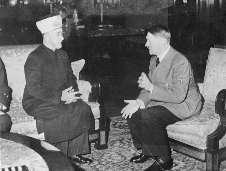 Hajj Amin al-Husayni seated with Adolf Hitler in Berlin on November 28, 1941